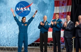 NASA Astronaut Jasmin Moghbeli celebrates during astronaut graduation at Johnson Space Center in Houston, Texas. PHOTO: MARK FELIX/ AFP