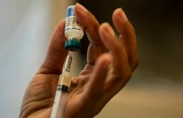 Measles vaccineA nurse draws a dose of mumps-measles-rubella, or MMR, vaccine. Photo: Mihaaru News