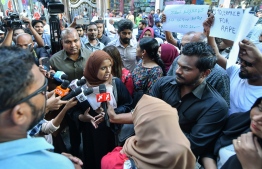 Gender Minister Shidhatha Shareef speaks to the press during a protest sparked by the Kanduhulhudhoo child sexual abuse case; the authorities are under severe fire over failure to ensure the safety of children, with many calling for the minister's resignation. PHOTO: NISHAN ALI / MIHAARU