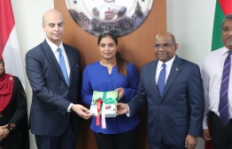 Egyptian Ambassador to Maldives Hussein El Saharty hands over the text books donated through Al-Azhar University to Arabiyya School, which were received by Minister of Education Aishath Ali and Minister of Foreign Affairs Abdulla Shahid. PHOTO/FOREIGN MINISTRY