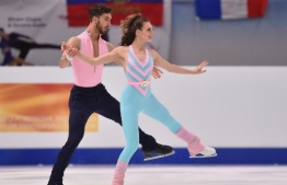 Gabriella Papadakis and Guillaume Cizeron of France perform in the pairs Ice Dance Rhythm Dance event of the ISU European Figure Skating Championships at the Steiermark hall in Graz, Austria, on January 23, 2020. (Photo by Daniel MIHAILESCU / AFP)