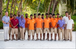 Holiday Island Resort Kandooma Maldives' Human Resource Team alongside General Manager Joseph Della Gatta (far left) and Executive Assistant Manager Hussain Shahid (far right). PHOTO: HOLIDAY INN KANDOOMA