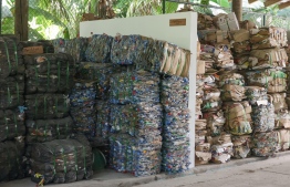 Compacted bunches of plastics and cardboard inside the eco centro at B.Maalhos. PHOTO: HAWWA AMANY ABDULLA / THE EDITION