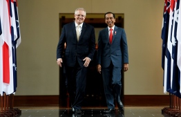 Australia's Prime Minister Scott Morrison (L) walks with Indonesian President Joko Widodo (R) as they leave the House of Representatives at Parliament House in Canberra on February 10, 2020. (Photo by Tracey Nearmy / POOL / AFP)