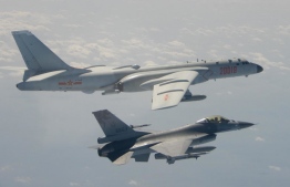 Chinese military aircraft crossed into Taiwanese aircraft. PHOTO: AFP