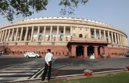 The Indian Parliament building stands in New Delhi, India, on Friday, March 16, 2012. PHOTO: PANKAJ NAGIA / BLOOMBERG