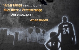 A section of the huge mural in honour of the late Kobe Bryant by artist PeQue Brown in the south Los Angeles, California neighborhood of Watts on February 14, 2020, a day after it was unveiled. - The 65 x 28 foot mural features multiple images of Bryant, including one with his daughter and the names of all the victims of the fateful January 26 helicopter crash. The former Los Angeles Laker and NBA star was buried in a private ceremony with his daughter on February 7 with a Kobe Bryant Memorial set for Monday February 24 at Staples Center. (Photo by Frederic J. BROWN / AFP) / 