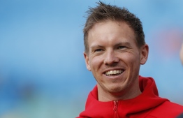 Leipzig's German headcoach Julian Nagelsmann smiles ahead the German first division Bundesliga football match RB Leipzig vs SV Werder Bremen, in Leipzig, eastern Germany on February 15, 2020. (Photo by Odd ANDERSEN / AFP) / DFL REGULATIONS PROHIBIT ANY USE OF PHOTOGRAPHS AS IMAGE SEQUENCES AND/OR QUASI-VIDEO