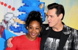 (FILES) In this file photo taken on February 12, 2020 US actress Tiffany Haddish and US-Canadian actor Jim Carrey attend a special screening of "Sonic the Hedgehog" at the Regency Village Theatre in Westwood, California. - Defying expectations, Paramount's new adventure comedy "Sonic the Hedgehog" took in $57 million this weekend to leap to the top of the North American box office, industry watcher Exhibitor Relations reported on February 16, 2020. That figure, based on a Friday-through-Sunday estimate, is expected to grow to $68 million when Monday's Presidents Day holiday in the US is included, proving an exception to the rule that films based on video games rarely excel at the box office. (Photo by Robyn Beck / AFP)