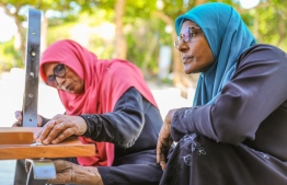 Women participating in efforts to establish the park in near Koagannu Cemetery in Hulhumeedhoo under BML's Aharenge Community Fund. PHOTO: BML