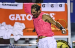 Spain's Rafael Nadal celebrates after defeating Bulgaria's Grigor Dimitrov (out of frame) during their Mexico ATP Open 500 men's semi-final singles tennis match in Acapulco, Guerrero State, Mexico on February 28, 2020. (Photo by PEDRO PARDO / AFP)