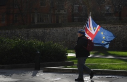 Anti-Brexit campaigners are seen in Westminster, central London on February 26, 2020. PHOTO: DANIEL LEAL-OLIVAS / AFP