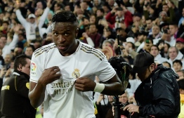 Real Madrid's Brazilian forward Vinicius Junior celebrates his goal during the Spanish League football match between Real Madrid and Barcelona at the Santiago Bernabeu stadium in Madrid on March 1, 2020. (Photo by OSCAR DEL POZO / AFP)