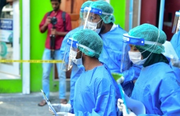 Participants at the joint drill held March 3, 2020, on precautions and response measures against a possible COVID-19 outbreak in Maldives. PHOTO: AHMED AWSHAN ILYAS / MIHAARU