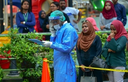 During the joint drill held in Male' on preventive and response measures against a COVID-19 outbreak. PHOTO: AHMED AWSHAN ILYAS / MIHAARU