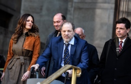 NEW YORK, NY - FEBRUARY 14: Movie producer Harvey Weinstein departs his sexual assault trial at New York Criminal Court with his lawyer Donna Rotunno (L) on February 14, 2020 in New York City. The weeks-long trial against Weinstein nears the end with the prosecution making closing arguments in today's trial.   Stephanie Keith/Getty Images/AFP