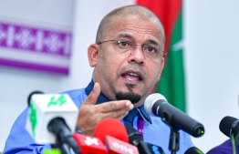President of the Elections Commission (EC) Ahmed Shareef speaking at a press conference. Shareef says that the Health Protection Agency must greenlight the local council election before December 15 to ensure that it can be held within the time frame granted by the law. PHOTO: MIHAARU