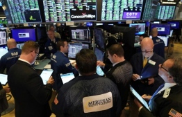 After suffering its worst session in more than 11 years at the beginning of the week, the Dow Jones Index in New York bounced back significantly, rising five percent. PHOTO: AFP
