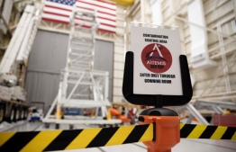Contamination control sign for the Artemis mission is seen at NASA Plum Brook Station in Sandusky, Ohio on March 14, 2020. - NASA held a special event for media and VIP's to showcase the new Orion Spacecraft. (Photo by Brad LEE / AFP)