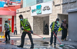 Male' City Council disinfecting the streets of capital city Male'. PHOTO: AHMED AWSHAN ILYAS / MIHAARU