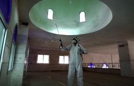 A member of the Syrian Civil Defence known as the "White Helmets" disinfects the interior of a mosque, as part of preventive measures taken against infections by the novel coronavirus, in the Syrian town of Dana, east of the Turkish-Syrian border in the northwestern Idlib province, on March 22, 2020. - Unlike Syria, its five neighbours, Iraq, Israel, Jordan, Lebanon and Turkey, have all reported cases of coronavirus.
The rebel-held and densely-populated province of Idlib in northwest Syria, besieged by government forces and facing severe shortages of medical supplies and facilities, would suffer the most from an outbreak. (Photo by AAREF WATAD / AFP)