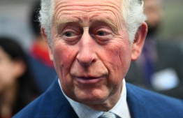 (FILES) In this file photo taken on March 04, 2020 Britain's Prince Charles, Prince of Wales reacts during his visit to the London Transport Museum in London on March 4, 2020, to take part in celebrations to mark 20 years of the museum. - Prince Charles, the eldest son and heir to Queen Elizabeth II, has tested positive for the new coronavirus, his office said on March 25, 2020. The 71-year-old is displaying mild symptoms of COVID-19 "but otherwise remains in good health", Clarence House said in a statement. (Photo by Victoria Jones / POOL / AFP)
