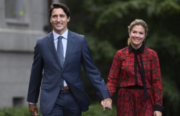 Sophie Gregoire Trudeau tested positive for the virus after returning from Britain, with her husband Canadian Prime Minister Justin Trudeau subsequently going into self-quarantine as a precautionary measure. PHOTO: AP