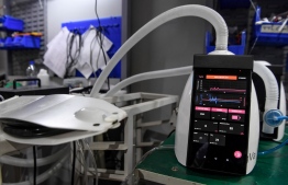 In this photo taken on March 25, 2020, a ventilator made by AgVa Healthcare is displayed at the research and development (R&D) centre in Noida in Uttar Pradesh state. - When a robot scientist and a neurosurgeon got together in 2016 to make one of the world's smallest ventilators for India's poor, they could not have imagined the pandemic that would see demand boom. (Photo by Prakash SINGH / AFP) / 