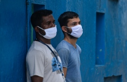 Citizens wearing face masks amid the COVID-19 outbreak in Male'. PHOTO: AHMED AWSHAN ILYAS/ MIHAARU