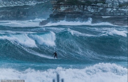 Bondi Beach in Sydney, Australia is to reopen for surfing as Australia virus cases slow. But the white sands will remain off-limits to sunbathers, joggers and families in an effort to maintain Australia's strict social distancing requirements. PHOTO: BILL MORRIS