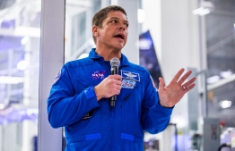 (FILES) In this file photo taken on October 10, 2019, NASA Astronaut Robert Behnken addresses the media during a press conference announcing new developments of the Crew Dragon reusable spacecraft, at SpaceX headquarters in Hawthorne, California. - A SpaceX rocket will send astronauts Robert Behnken and Douglas Hurley on a SpaceX Falcon 9 rockets to the International Space Station on May 27, 2020, NASA announced on May 1, the first crewed spaceflight from the US in nearly a decade. (Photo by Philip Pacheco / AFP)