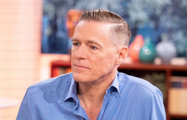 ބްރަޔަން އެޑަމްސް ކޮރޯނާވައިރަސް ޗައިނާއާ ގުޅުވައިފި