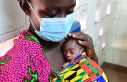 Mother with newborn child. PHOTO: UNICEF