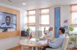 Health Minister Abdulla Ameen (L) speaks with WHO Representative Dr Arvind Mathur during the virtual ceremony held May 18, 2020, during which the WHO donated 10,000 testing kits for COVID-19 and PPE to Maldives. PHOTO/HEALTH MINISTRY