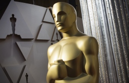 (FILES) In this file photo taken on February 8, 2020 an Oscars statue is displayed on the red carpet area on the eve of the 92nd Oscars ceremony at the Dolby Theatre in Hollywood, California. - Next year's Oscars could be postponed due to the disruption caused by the coronavirus in Hollywood, trade publication Variety reported on May 19, 2020. The movie industry's biggest night is currently scheduled for February 28. (Photo by Mark RALSTON / AFP)
