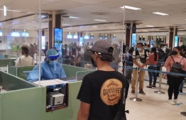 Foreigners seeking services at the immigration office. PHOTO: MALDIVES IMMIGRATION
