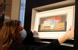Pablo Picasso’s Nature Morte, worth €1m, was won by a €100 raffle ticket, bought by an Italian man for his mother as a Christmas present. PHOTO: CHARLES PLATIAU/REUTERS