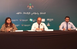 Minister of Finance Ibrahim Ameer (C) alongside Maldives Pension Administration Office (MPAO)'s Acting Chief Executive Officer Fathimath Sujatha Haleem (L) and Ministry of Finance's Chief Financial Budget Executive and Head of Fiscal Affairs Department, Ahmed Saruvash Adam. PHOTO: PRESIDENT'S OFFICE / NATIONAL EMERGENCY OPERATIONS CENTRE