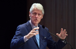 (FILES) In this file photo former US President Bill Clinton speaks at the fifth annual Town & Country Philanthropy Summit on May 9, 2018 at Hearst Tower in New York City. - Former US president Bill Clinton will publish another crime novel, co-author James Patterson said May 21, 2020, this time centered on the kidnapping of an American first daughter.
The two-term Democratic leader co-wrote the thriller entitled "The President's Daughter" with renowned author Patterson, the pair's second book following 2018's behind-the-scenes White House drama "The President is Missing." (Photo by ANGELA WEISS / AFP)