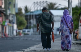 Two elderly individuals seen having a walk in the capital city Male'. Recent government phase-out of lockdown restrictions allow the elderly population to leave their residences during 0600 hrs to 0800 hrs. PHOTO: NISHAN ALI / MIHAARU