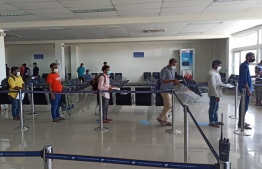 An earlier photograph of Bangladeshi nationals preparing to board their repatriation flight at Velana International Airport. PHOTO: MALDIVIAN