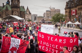 A protest denouncing colonization took place during Canada Day celebrations in Ottawa on July 1, 2017. PHOTO: ALEX TETREAULT / CANADA'S NATIONAL OBSERVER