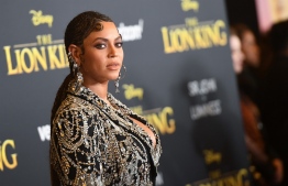 (FILES) In this file photo US singer/songwriter Beyonce arrives for the world premiere of Disney's "The Lion King" at the Dolby theatre on July 9, 2019 in Hollywood. - Beyonce on June 7 delivered a message to the graduating Class of 2020, marking their achievement with a speech amplifying messages of the Black Lives Matter movement and praising change-makers. (Photo by Robyn Beck / AFP)
