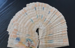 Cash notes amounting to MVR100,000 found on a road in Hithadhoo, Addu Atoll; the cash was turned into police by an expatriate worker on June 5, 2020. PHOTO/POLICE