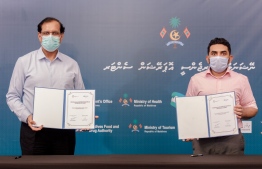 Minister of Health Abdulla Ameen (R) and World Health Organisation (WHO) Resident Representative to Maldives Dr Arvind Mathur. PHOTO: MINISTRY OF HEALTH 