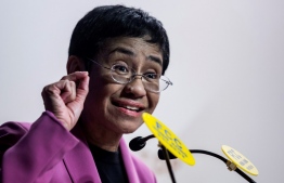 (FILES) This file photo taken on May 16, 2019 shows Maria Ressa, co-founder and CEO of the Philippines-based news website Rappler, speaking at the Human Rights Press Awards at the Foreign Correspondents Club in Hong Kong. - Philippine journalist Maria Ressa faces the threat of prison when the verdict is handed down on June 15, 2020 in her libel trial, a case watchdogs say is aimed at silencing critics of President Rodrigo Duterte. (Photo by Isaac LAWRENCE / AFP)
