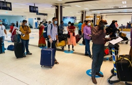 indians waiting to board at the airport