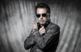 (FILES) In this file photo taken on October 17, 2018 French musician Jean-Michel Jarre poses during a photo session in Paris. - French electronic music legend Jean-Michel Jarre told AFP on June 17, 2020 that he is going to perform the world's first "avatar" concert -- "like in the Matrix". The veteran star will play live on June 21, in a virtual universe created for the French midsummer Festival of Music where he will be joined by "the audience as avatars who will be totally immersed" in his musical world. (Photo by JOEL SAGET / AFP)