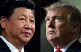 (FILES) This file combination of pictures created on May 14, 2020 shows recent portraits of  
China's President Xi Jinping (L) and US President Donald Trump. (Photos by Dan Kitwood and Nicholas Kamm / AFP)