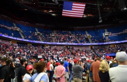The upper section of the arena is seen partially empty as US President Donald Trump speaks during a campaign rally at the BOK Center on June 20, 2020 in Tulsa, Oklahoma. - Hundreds of supporters lined up early for Donald Trump's first political rally in months, saying the risk of contracting COVID-19 in a big, packed arena would not keep them from hearing the president's campaign message. (Photo by Nicholas Kamm / AFP)